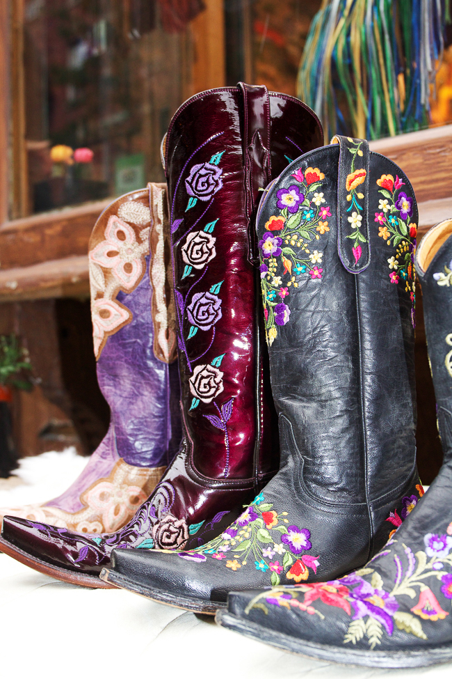 Bold purple and black cowboy boots at Space Cowboy NYC
