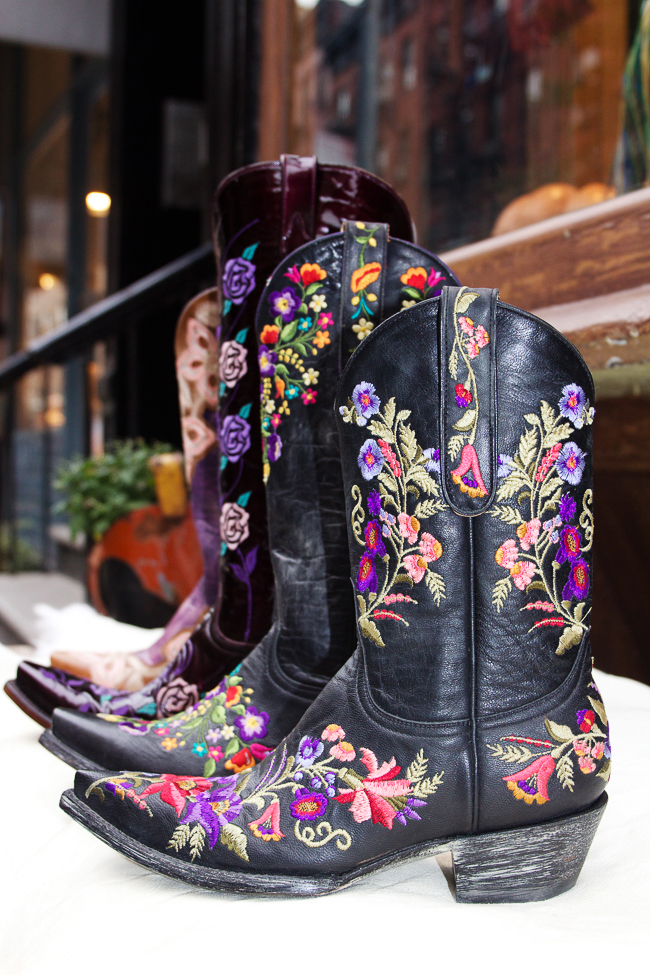 Purple and black cowboy boots at Space Cowboy NYC