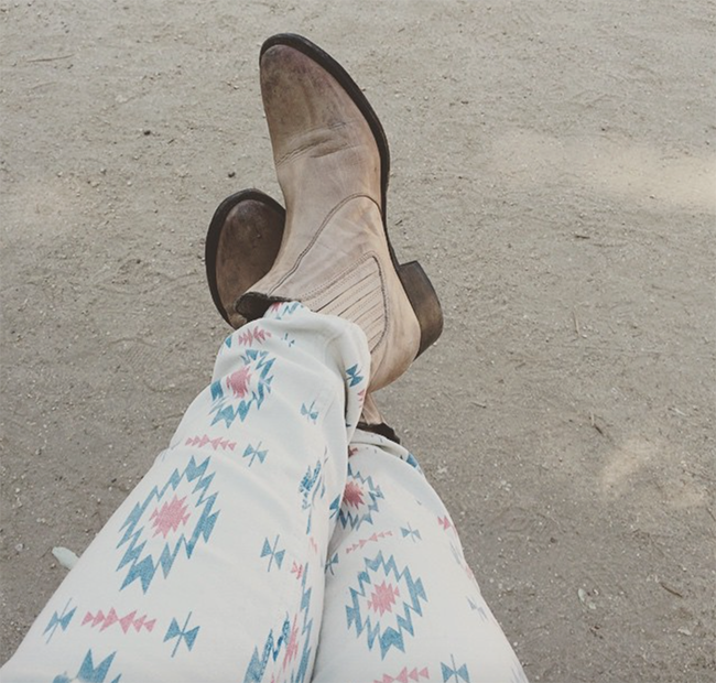 Shorty boots and tribal print jeans