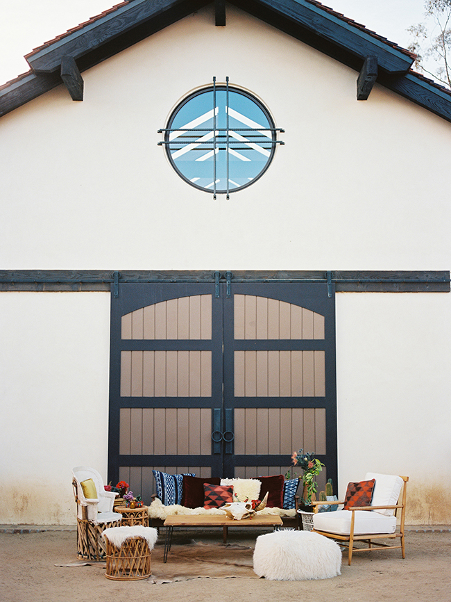 Southwestern and Boho Seating in front of the barn