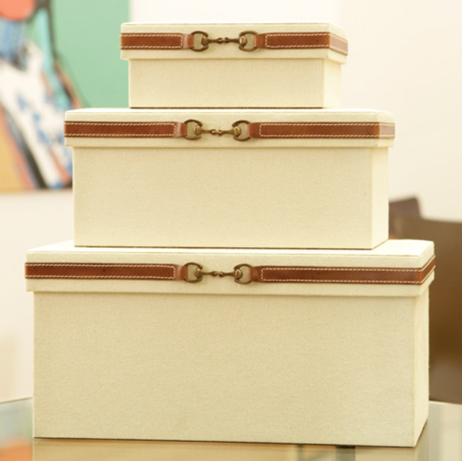 Decorative stack of equestrian snaffle bit boxes