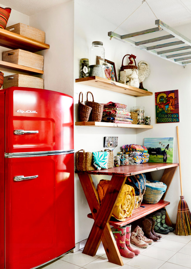 Mudroom and entry area with a vintage red fridge