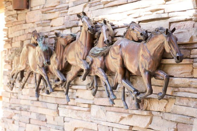 Running horses metal sculpture