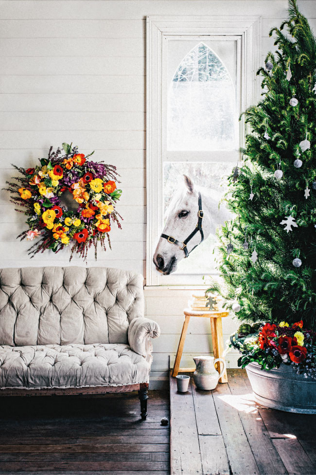 Charming rustic Christmas decor and a grey horse