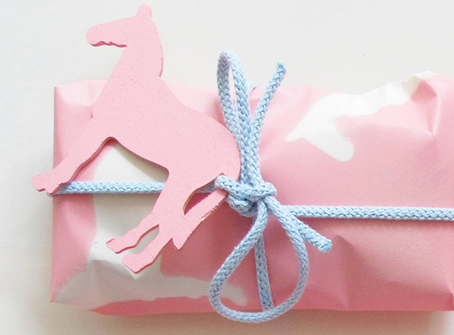 Pink horse cut out and pink wrapping paper