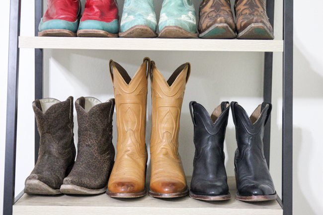 cowboy boots on a shelf