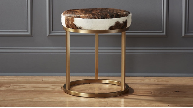 brass brown and white cowhide stool