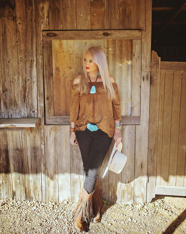 Jennifer wearing fringe boots, brown - black, and turquoise jewelry