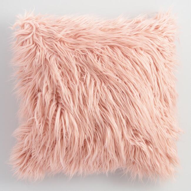 blush Mongolian faux fur throw pillow